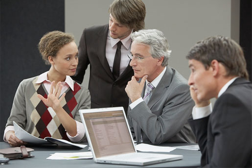 Klique Marketing team collaborating on an IT solution for a Nairobi client